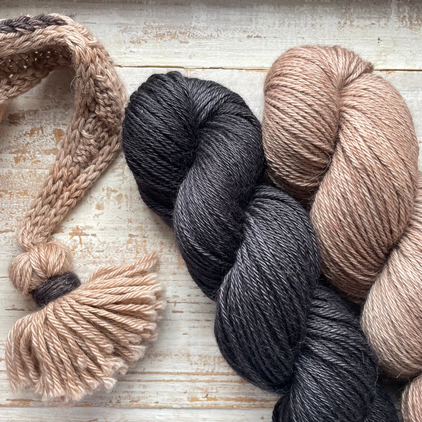 A skein of Eclipse yarn weighing 20g in colorway Intuition - Positive Attitude which is globally multicolored