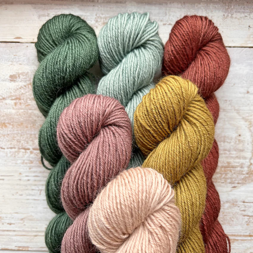 A skein of Meteorite yarn weighing 50g in colorway Undyed which is globally the color white