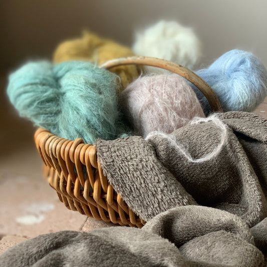 A skein of Truffula yarn in colorway Undyed which is globally the color white